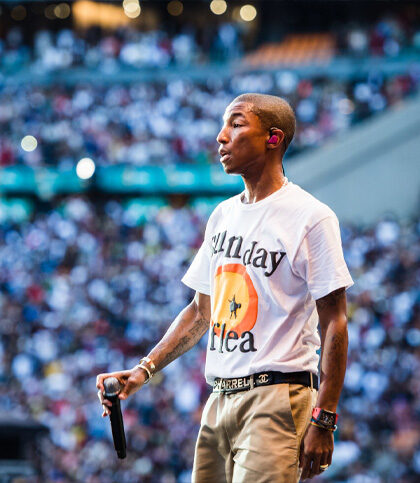 Pharrell live concert stage with LED backdrop and performance lighting
